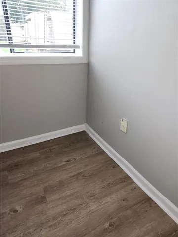 a view of a window in an empty room