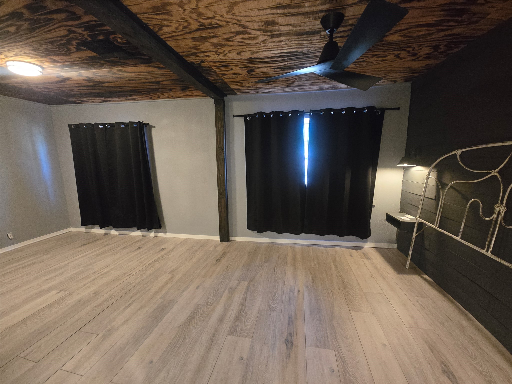 1045 Vine Drive Angleton, TX 77515 - Photo 14 of 48 a view of an empty room with wooden floor