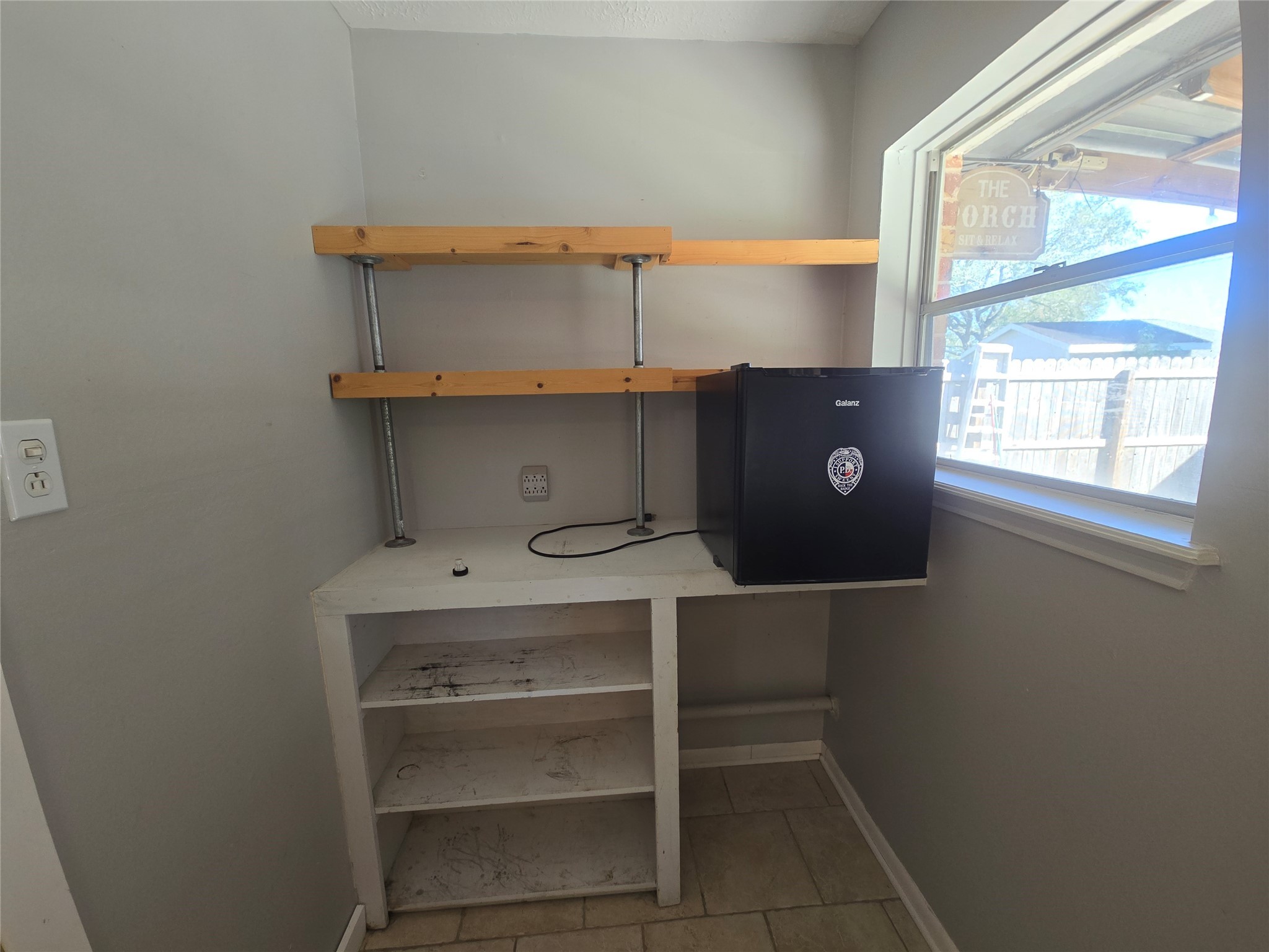 1045 Vine Drive Angleton, TX 77515 - Photo 22 of 42 a room with a closet and window