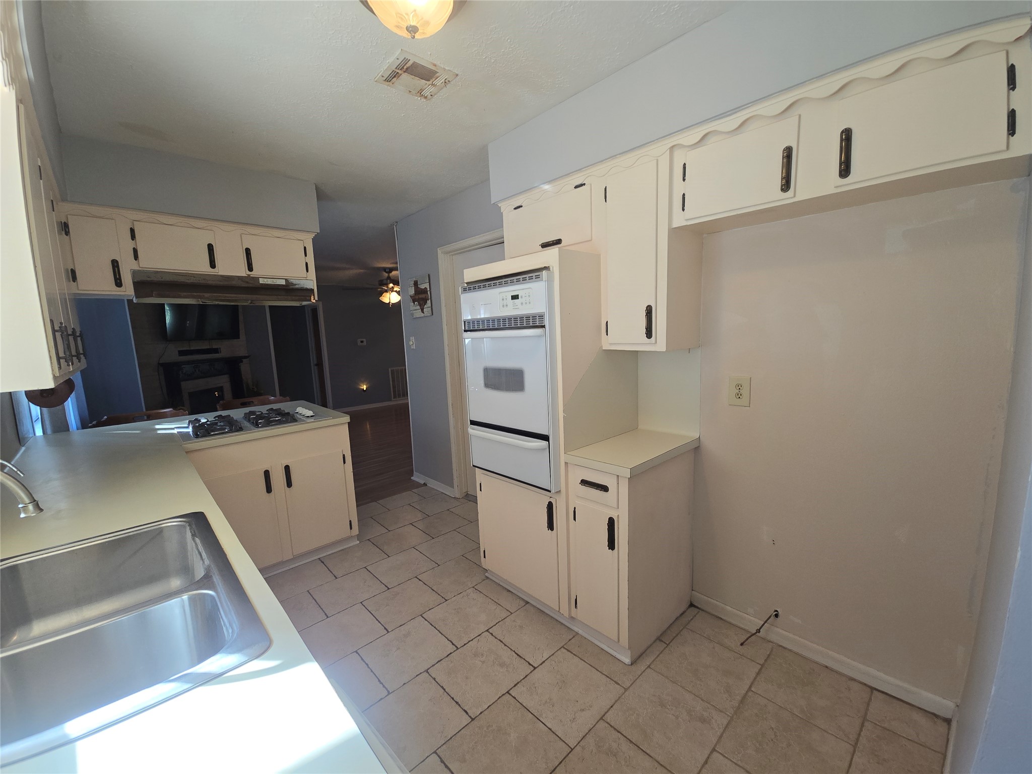 1045 Vine Drive Angleton, TX 77515 - Photo 23 of 48 a utility room with cabinets washer and dryer