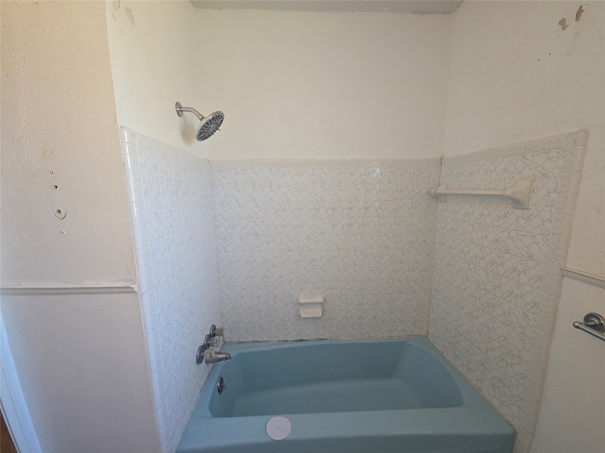 1045 Vine Drive Angleton, TX 77515 - Photo 35 of 42 a close up of a bathtub