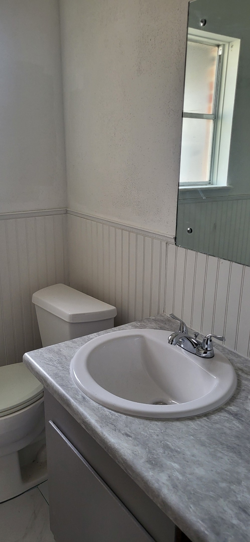 1045 Vine Drive Angleton, TX 77515 - Photo 35 of 48 a bathroom with a toilet and a sink