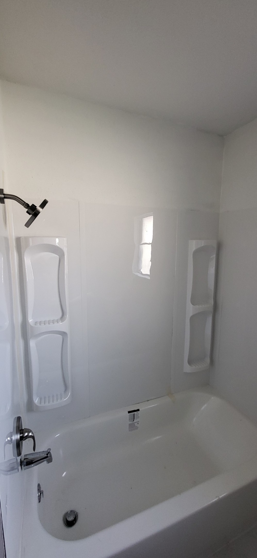 1045 Vine Drive Angleton, TX 77515 - Photo 36 of 48 a bathroom with a bathtub