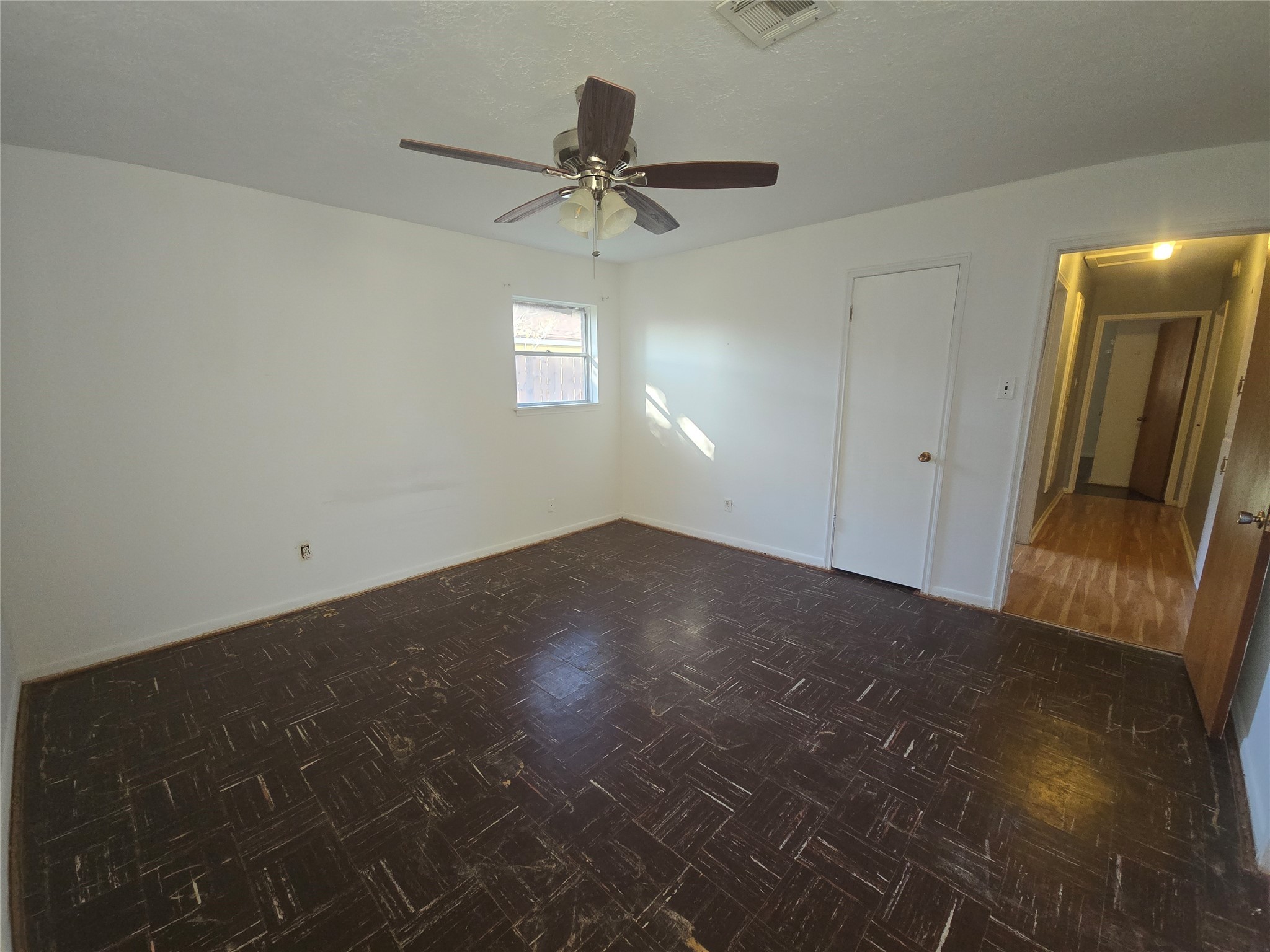 1045 Vine Drive Angleton, TX 77515 - Photo 37 of 42 a view of a livingroom with a ceiling fan and window