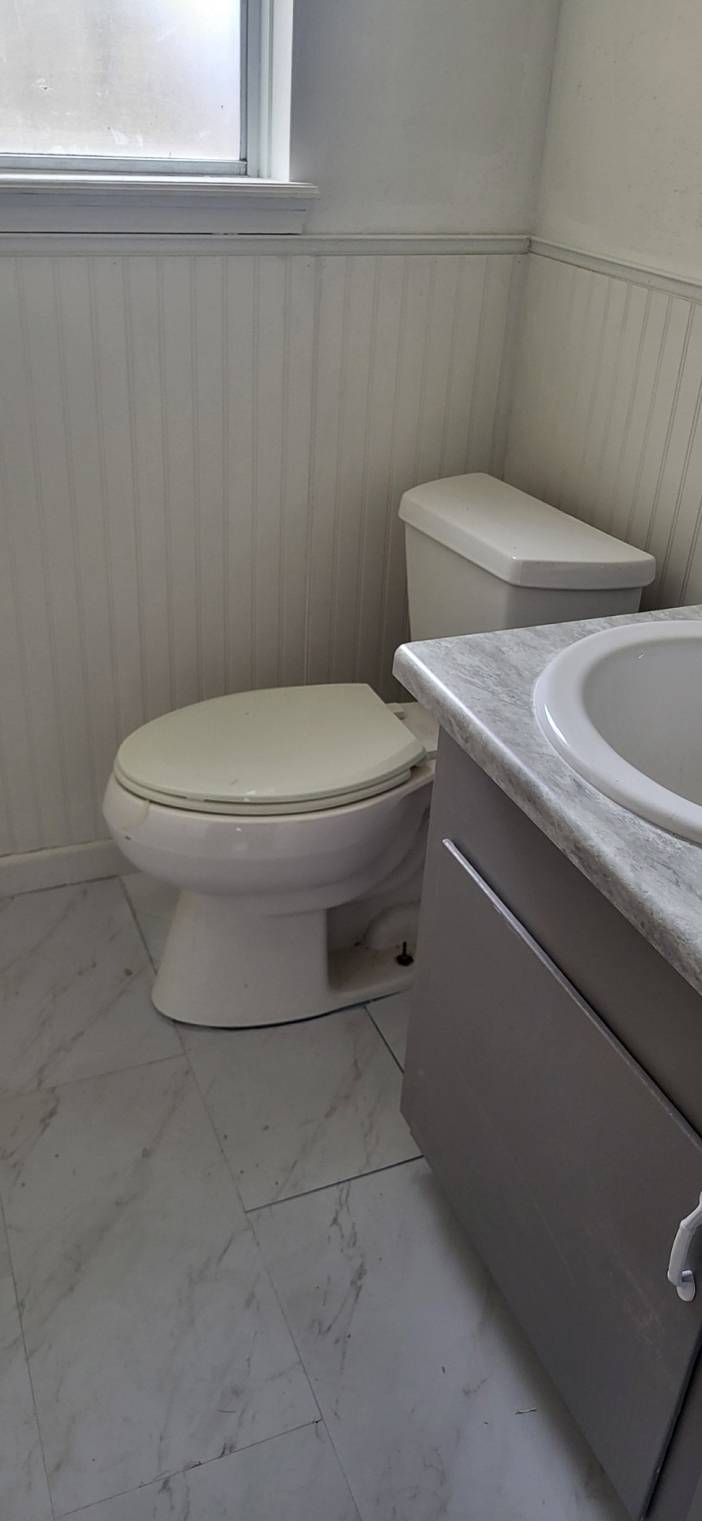 1045 Vine Drive Angleton, TX 77515 - Photo 38 of 48 a bathroom with a toilet and a sink