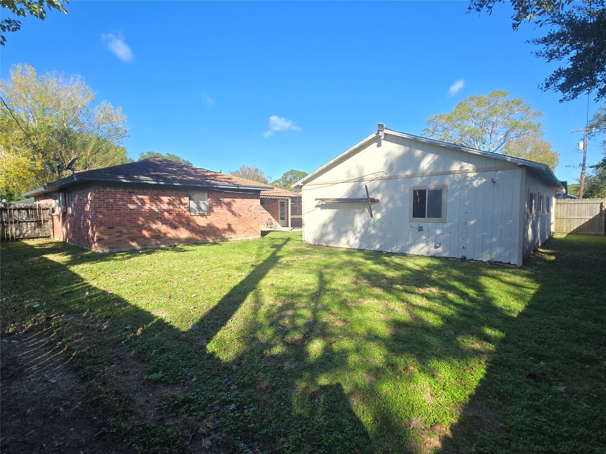 1045 Vine Drive Angleton, TX 77515 - Photo 4 of 42 a front view of house with yard and green space