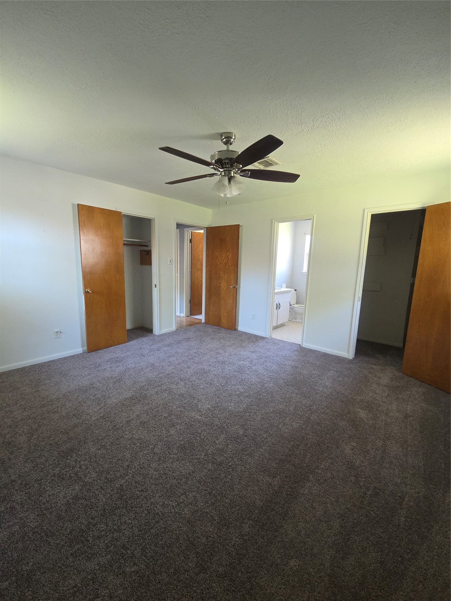1045 Vine Drive Angleton, TX 77515 - Photo 46 of 48 a view of a livingroom with a ceiling fan and window