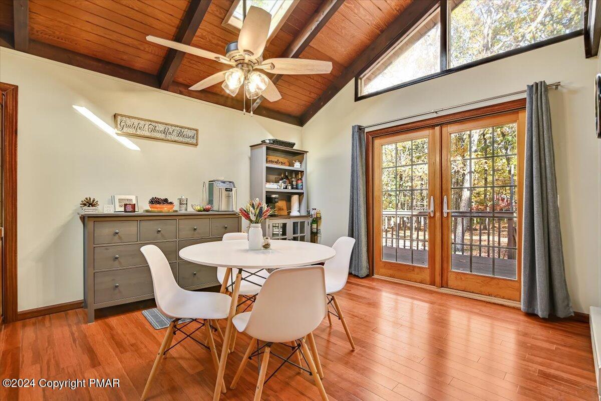 3567 High Crest Road Canadensis, PA 18325 - Photo 15 of 62 a view of a dining room with furniture window and wooden floor