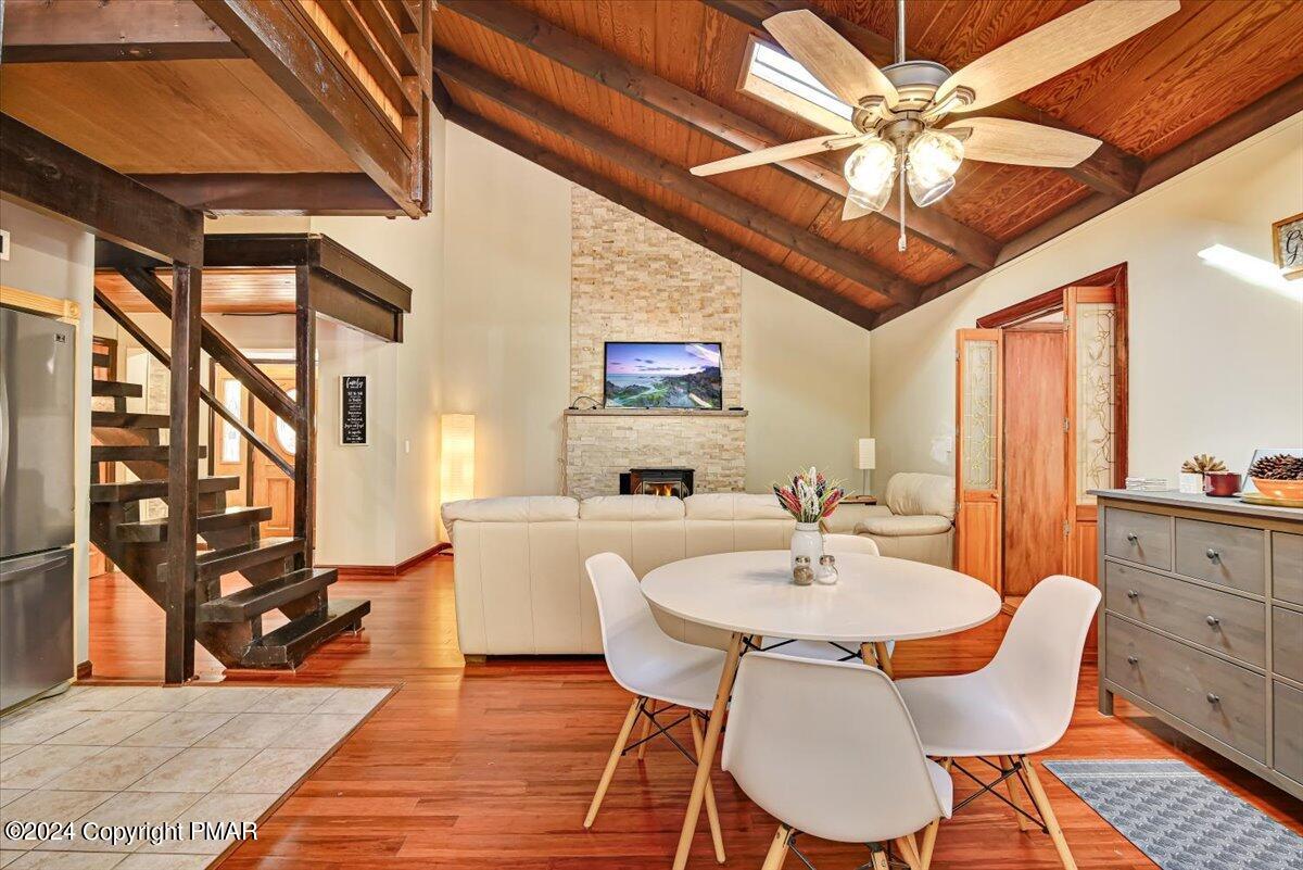 3567 High Crest Road Canadensis, PA 18325 - Photo 16 of 62 a dining room with furniture a chandelier and wooden floor
