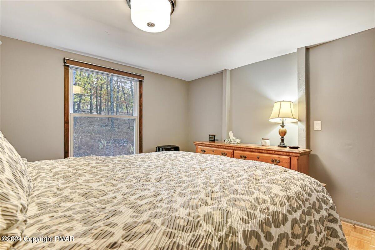 3567 High Crest Road Canadensis, PA 18325 - Photo 27 of 62 a bedroom with a bed and a dresser