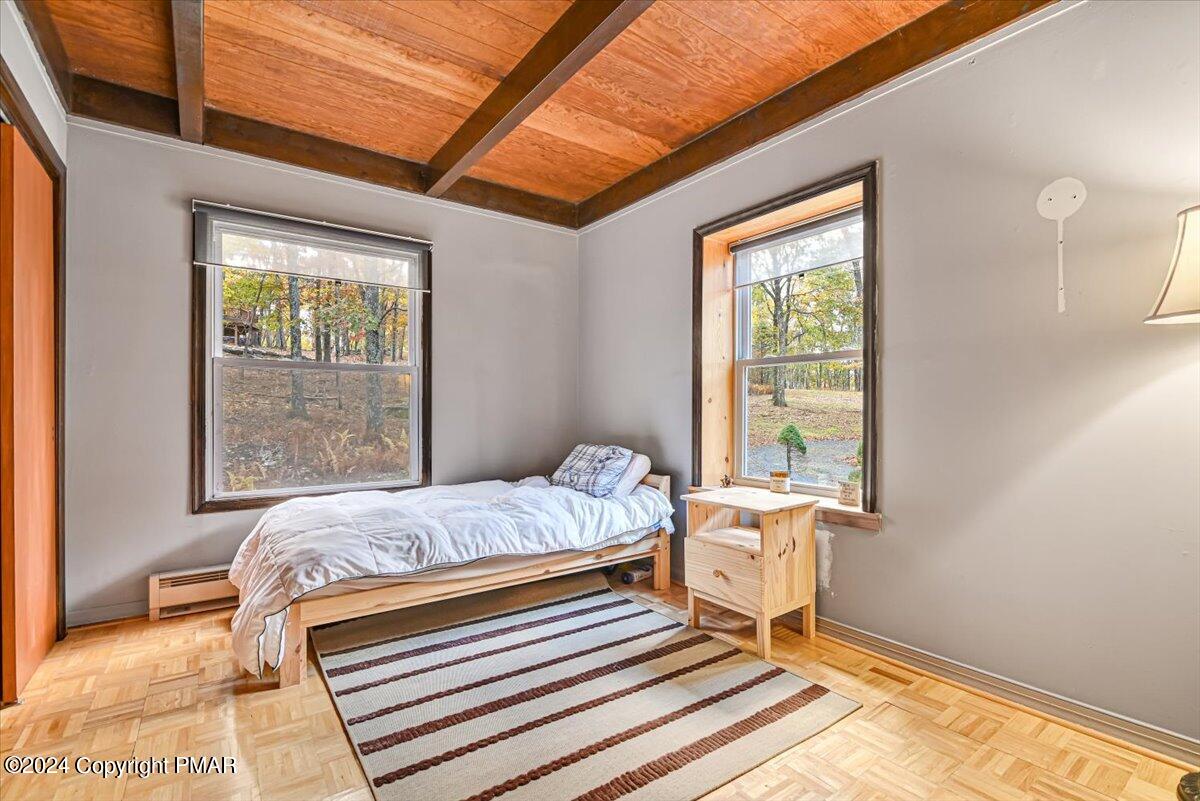 3567 High Crest Road Canadensis, PA 18325 - Photo 28 of 62 a bedroom with a bed and a window