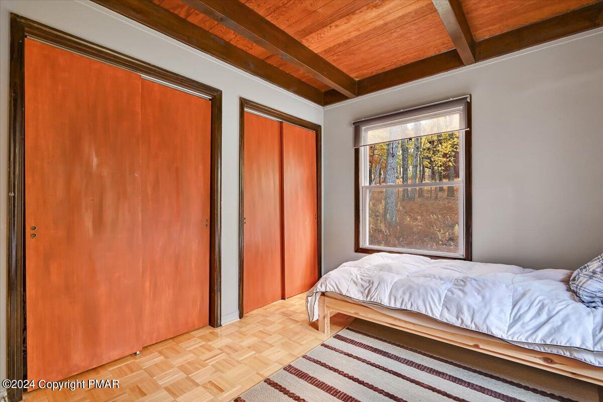 3567 High Crest Road Canadensis, PA 18325 - Photo 29 of 62 a bedroom with a bed and a window
