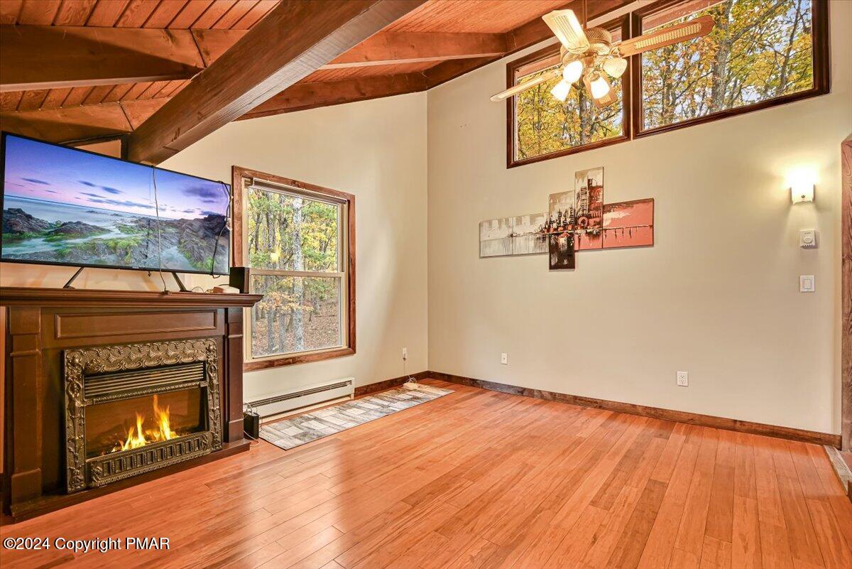 3567 High Crest Road Canadensis, PA 18325 - Photo 32 of 62 a view of a room with wooden floor and fireplace