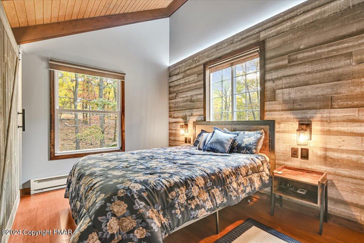 3567 High Crest Road Canadensis, PA 18325 - Photo 35 of 62 a bedroom with a bed and a window