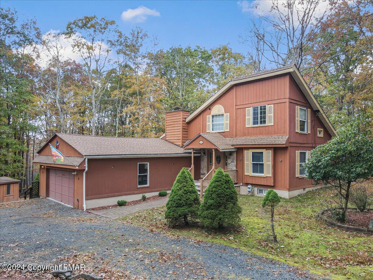 3567 High Crest Road Canadensis, PA 18325 - Photo 4 of 62 a view of a yard in front of a house with large tree