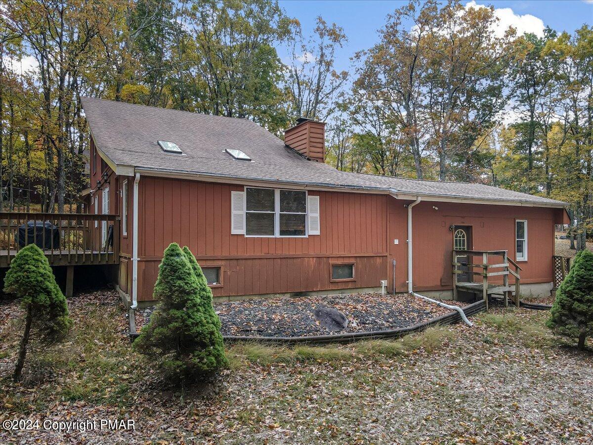 3567 High Crest Road Canadensis, PA 18325 - Photo 40 of 62 a view of a house with a yard and plants