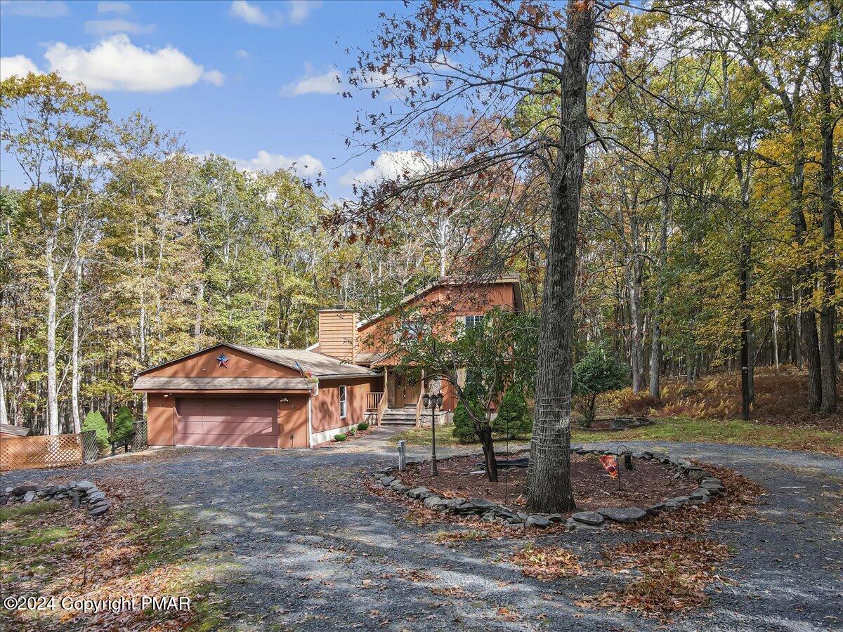 3567 High Crest Road Canadensis, PA 18325 - Photo 48 of 62 a view of a house with a yard