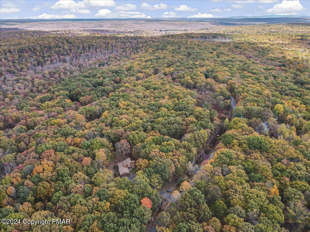 3567 High Crest Road Canadensis, PA 18325 - Photo 55 of 62 a view of a city with lush green forest