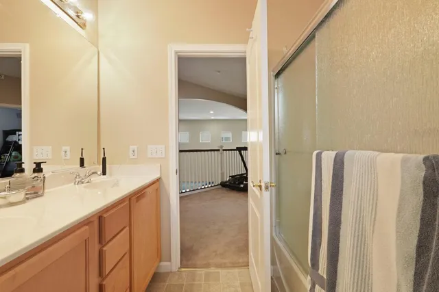 a bedroom with furniture and flat screen tv