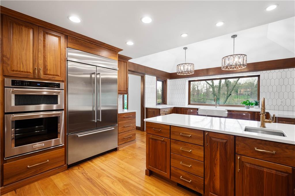 9599 Kummer Road Allison Park, PA 15101 - Photo 13 of 47 Kitchenaid appliances include 2 convection ovens plus a convection microwave and built-in refrigerator.