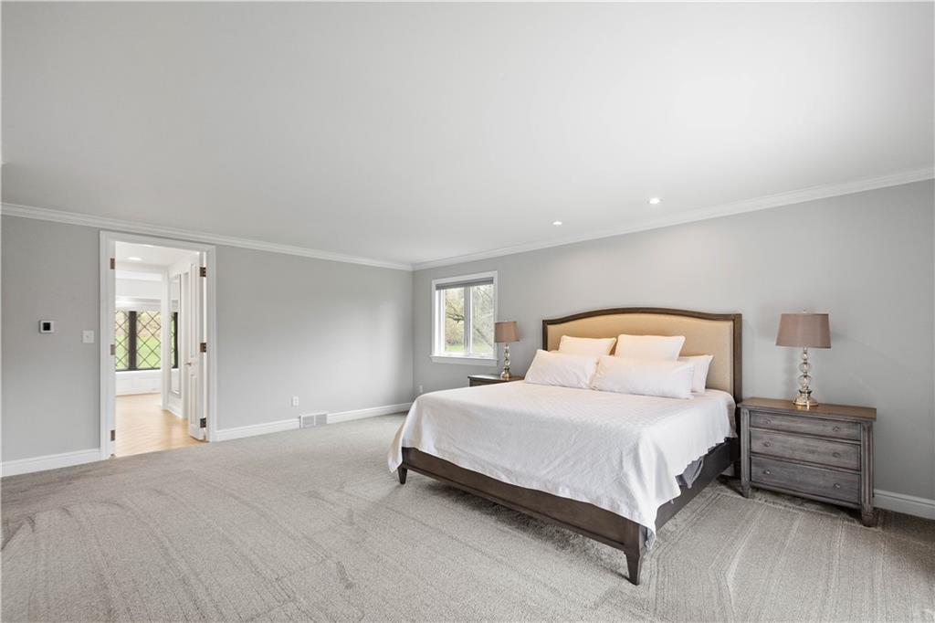 9599 Kummer Road Allison Park, PA 15101 - Photo 27 of 47 First floor primary bedroom with new carpet and updated spa bath!