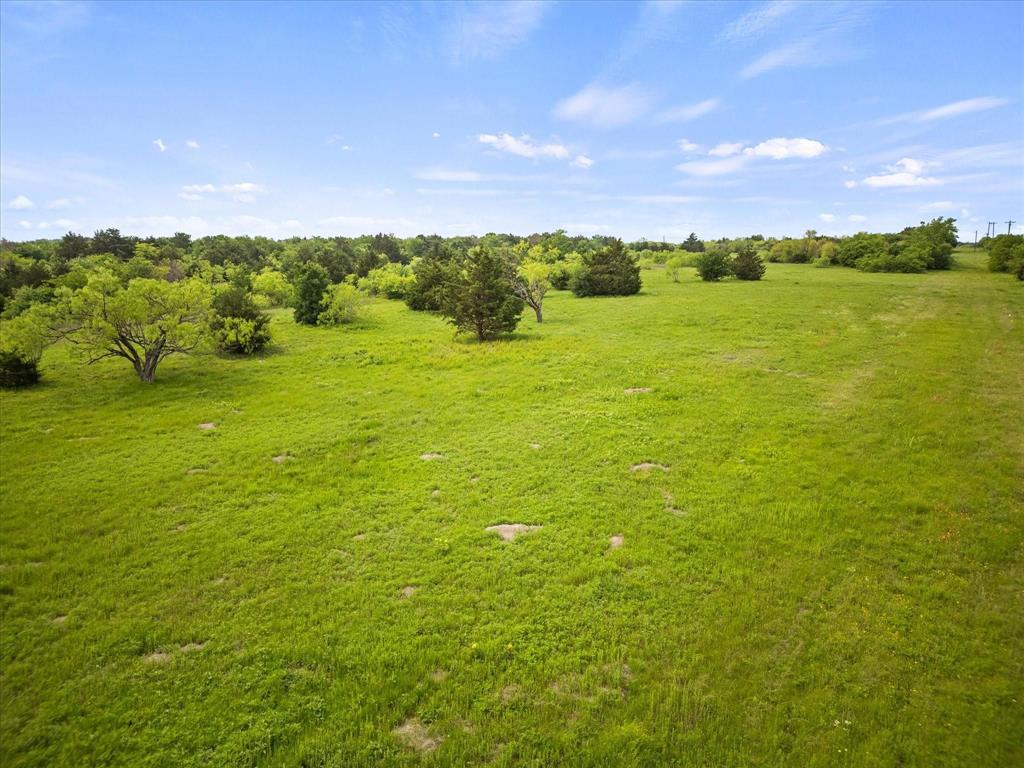 19498 Highway 34, Unit 2A Terrell, TX 75161 - Photo 4 of 6 a view of an ocean and a yard