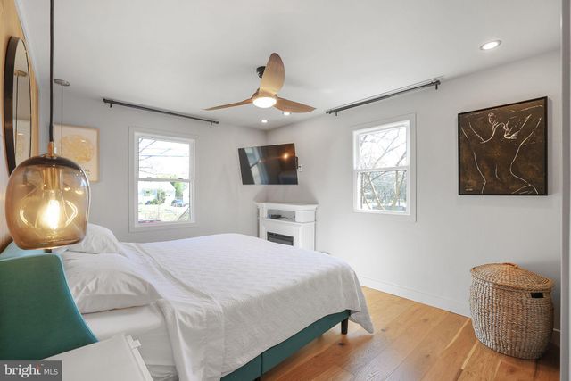 a bathroom with a double vanity sink mirror and double