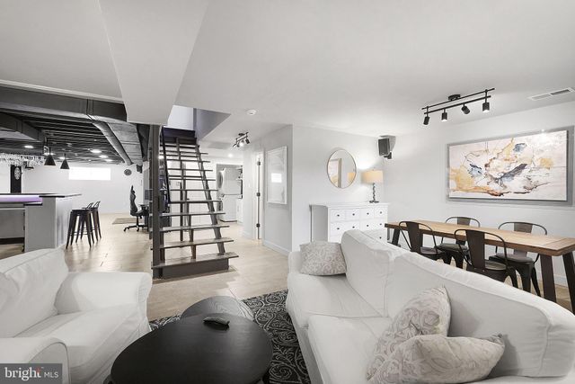 a view of a chairs and a chandelier