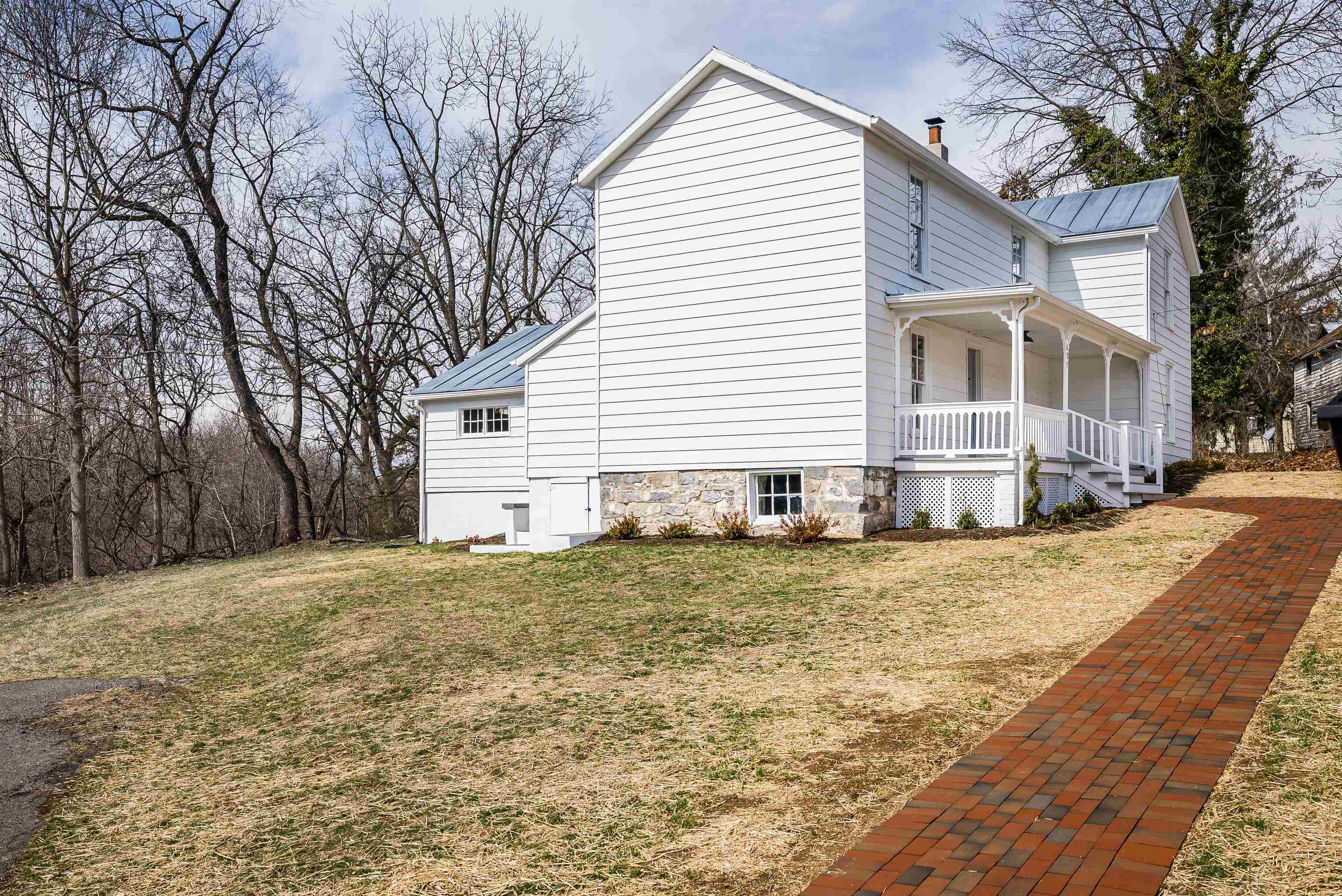 675 Stone Spring Road Harrisonburg, VA 22801 - Photo 35 of 39 a front view of a house with a yard and garage
