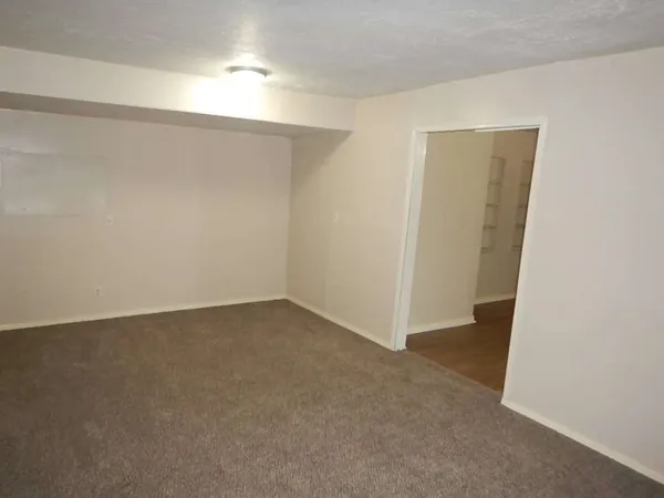 an empty room with a workbench