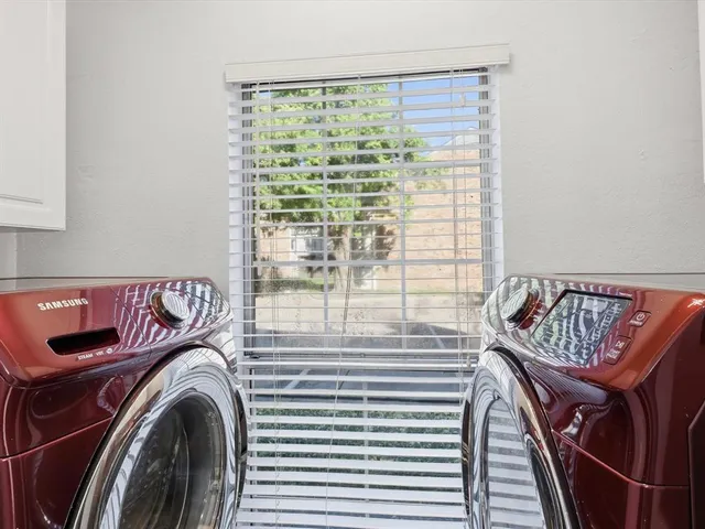 a view of a kitchen with a sink