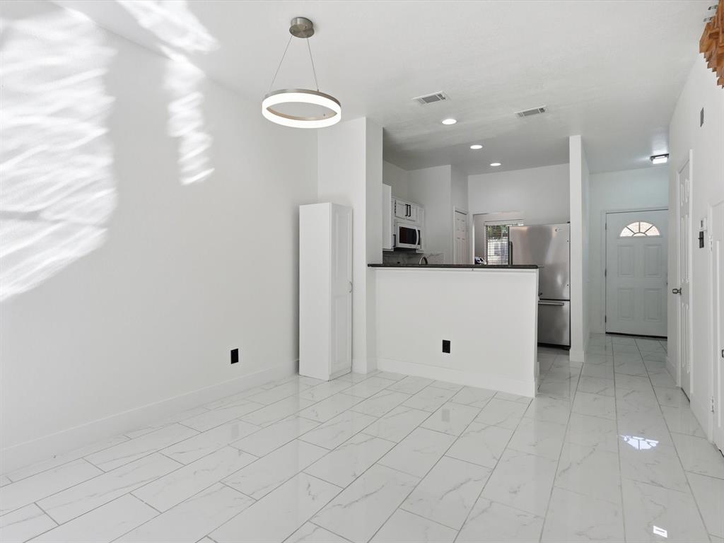 3801 14th Street, Unit 1302 Plano, TX 75074 - Photo 16 of 25 a view of a kitchen with a sink