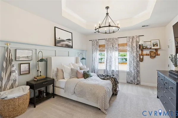 a bedroom with bed and a window