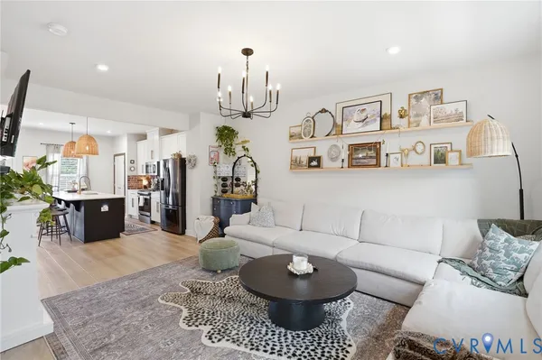 a living room with furniture and a couch
