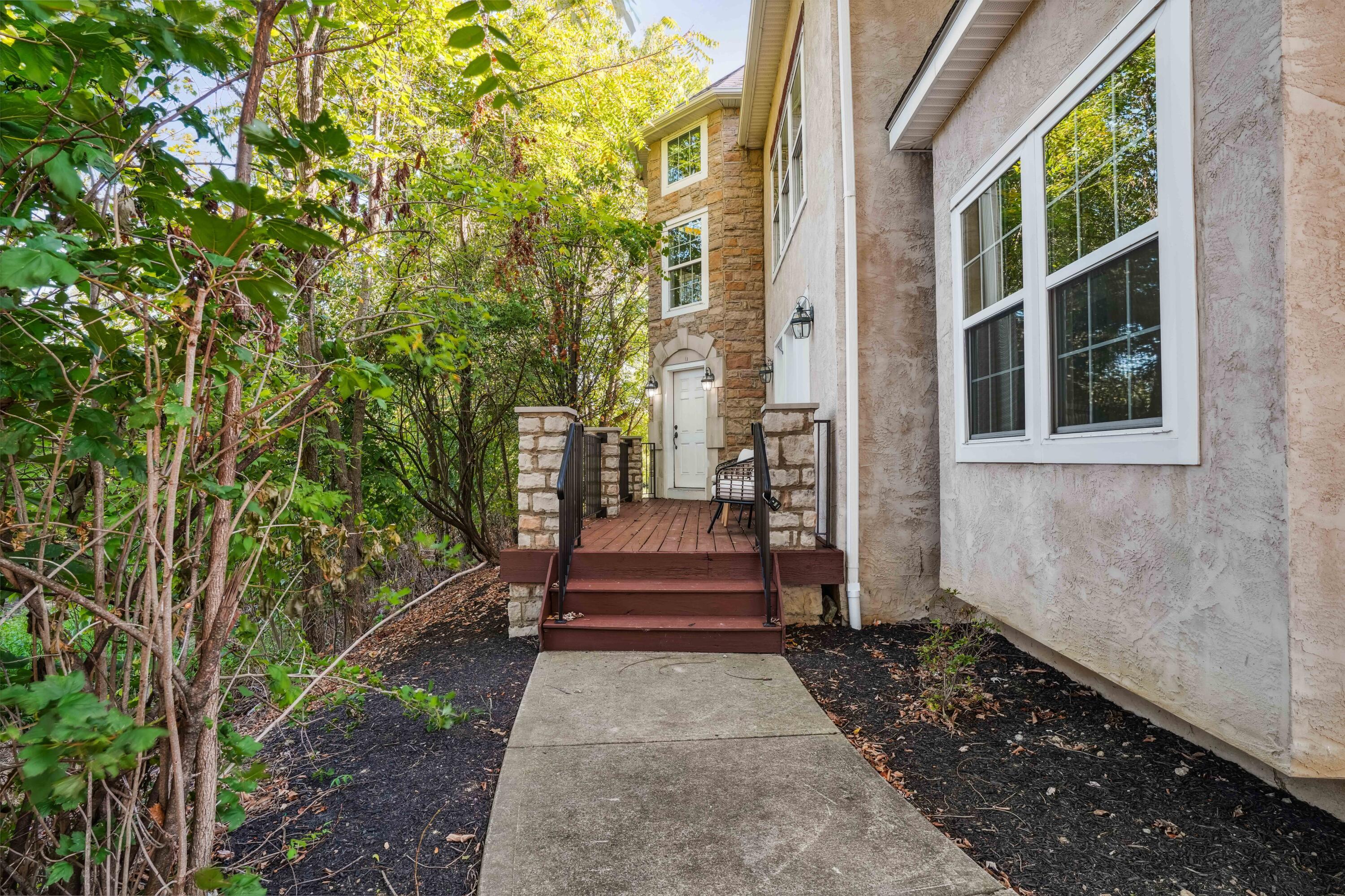 10403 Liberty Road Powell, OH 43065 - Photo 63 of 76 Front Deck, perfect for relaxing with views of the trees and pond!
