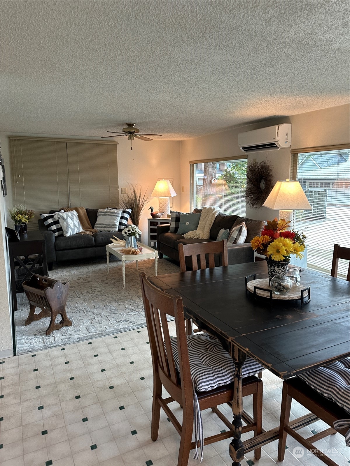 7140 Northeast North Shore Road Belfair, WA 98528 - Photo 12 of 31 a living room with furniture and a dining table