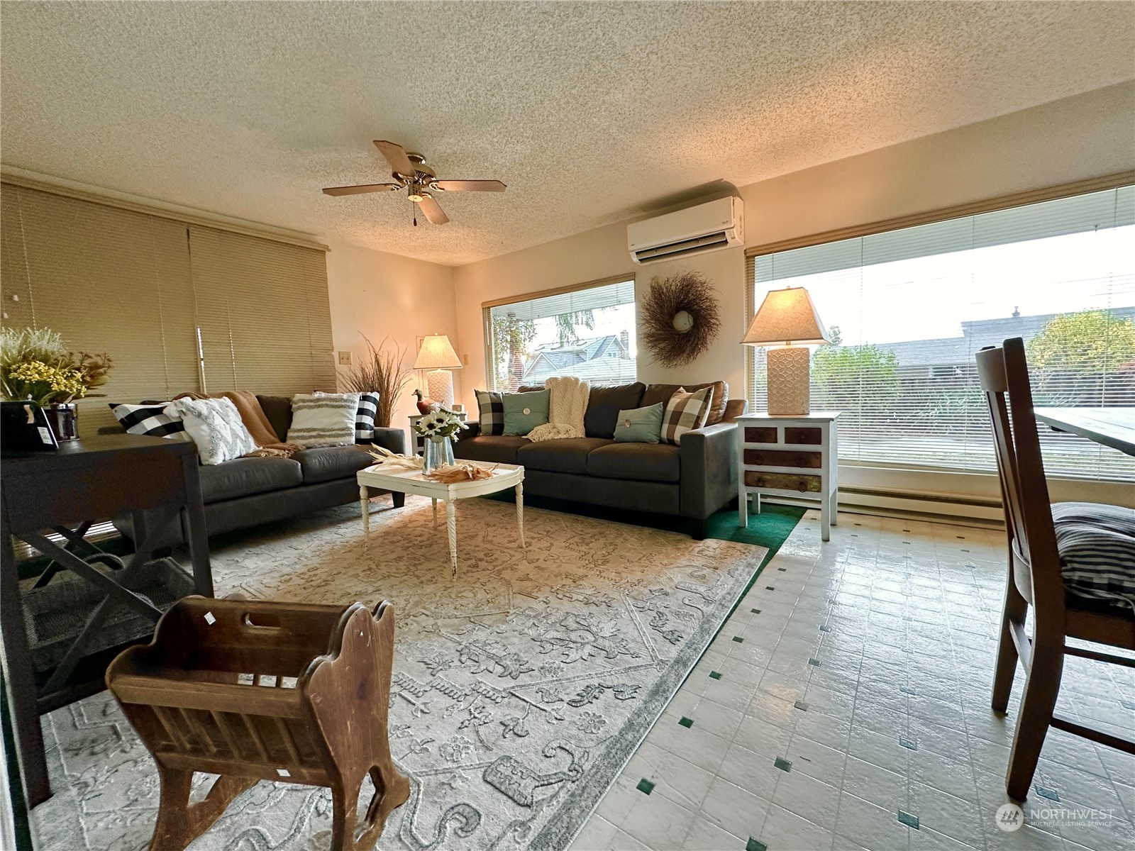 7140 Northeast North Shore Road Belfair, WA 98528 - Photo 13 of 31 a living room with furniture and a large window