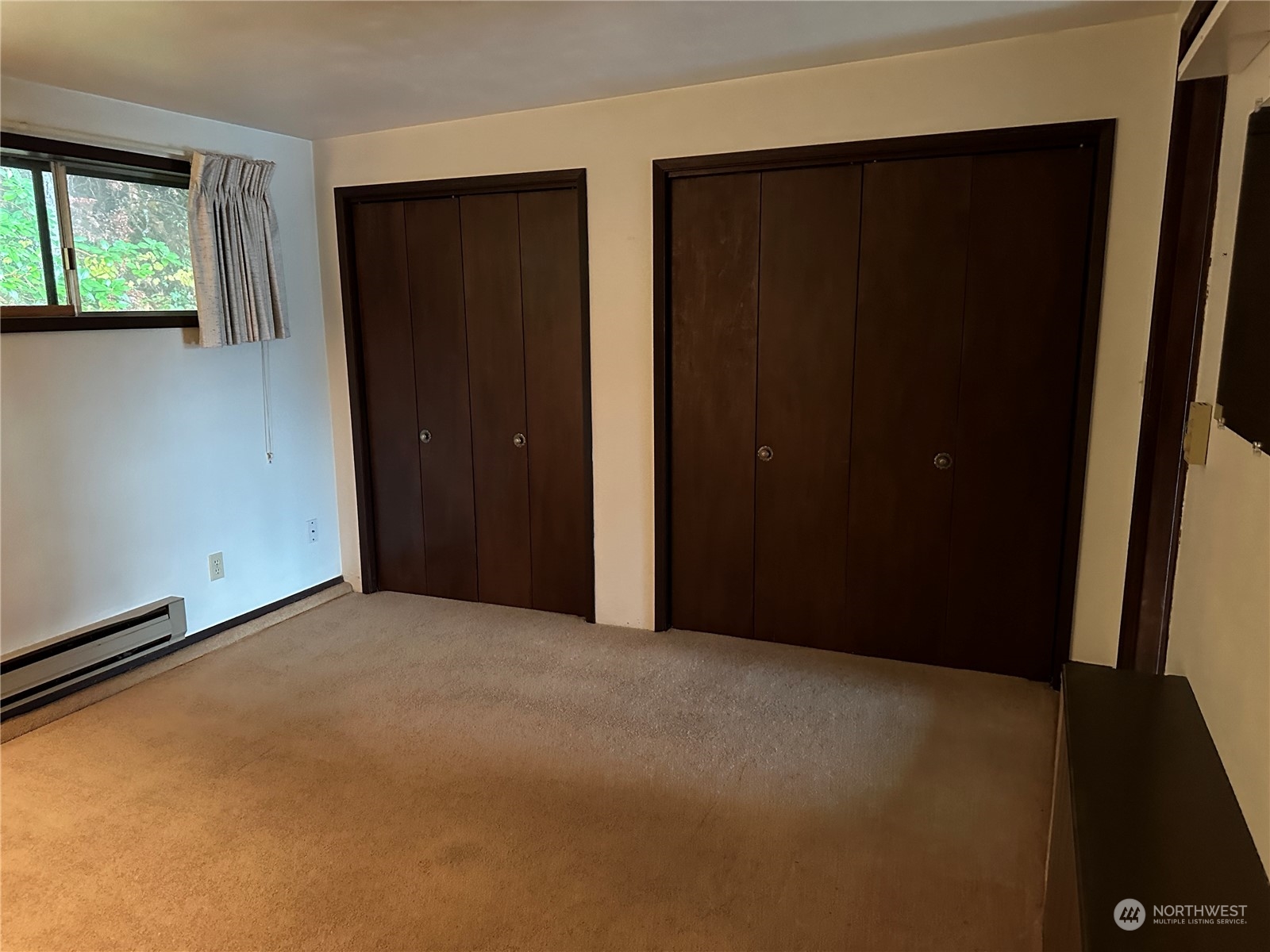 7140 Northeast North Shore Road Belfair, WA 98528 - Photo 20 of 31 an empty room with windows