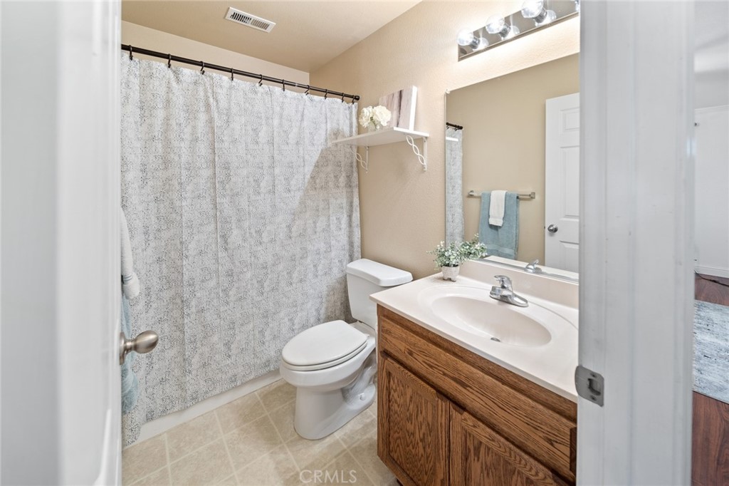 1587 Lexus Lane Chico, CA 95926 - Photo 11 of 25 a bathroom with a sink toilet and shower