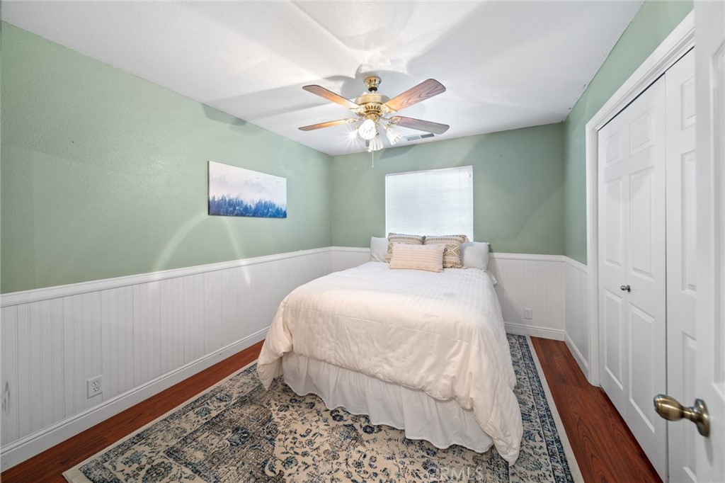 1587 Lexus Lane Chico, CA 95926 - Photo 18 of 25 a bedroom with a bed and a window