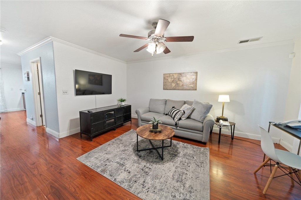 1587 Lexus Lane Chico, CA 95926 - Photo 4 of 25 a living room with furniture and a flat screen tv