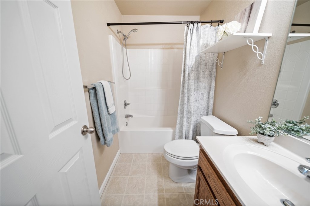1587 Lexus Lane Chico, CA 95926 - Photo 10 of 25 a bathroom with a sink toilet and shower