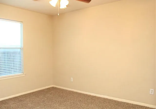 an empty room with a window