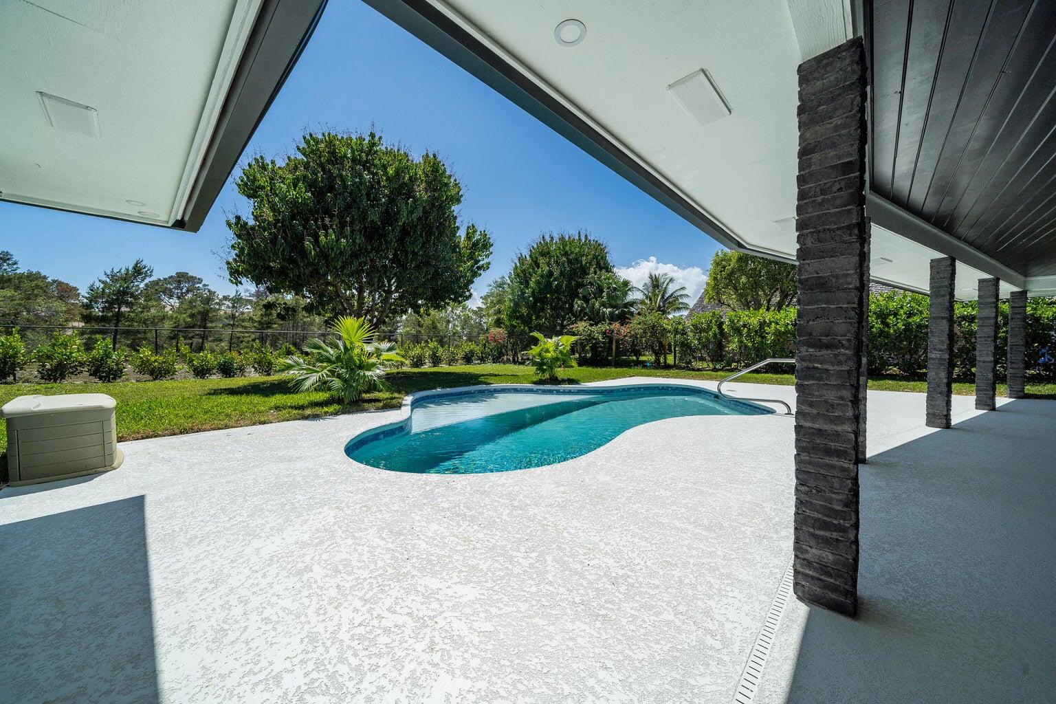 18721 Southeast River Ridge Road Jupiter, FL 33469 - Photo 50 of 74 Pool and Patio area