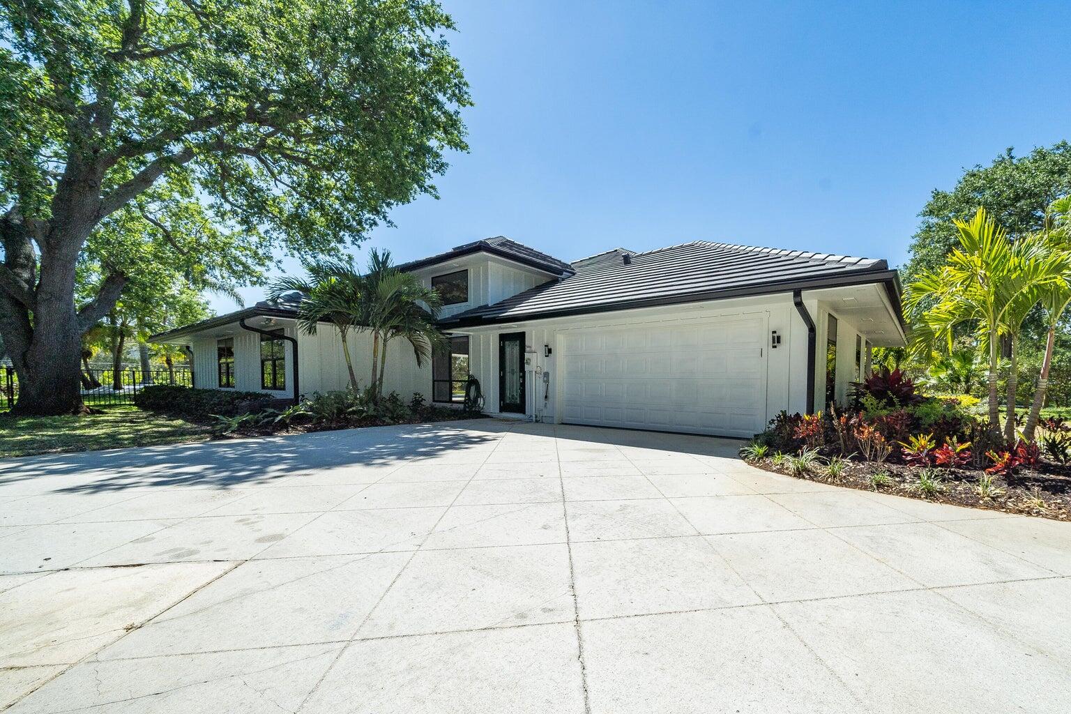 18721 Southeast River Ridge Road Jupiter, FL 33469 - Photo 53 of 74 Side view 2