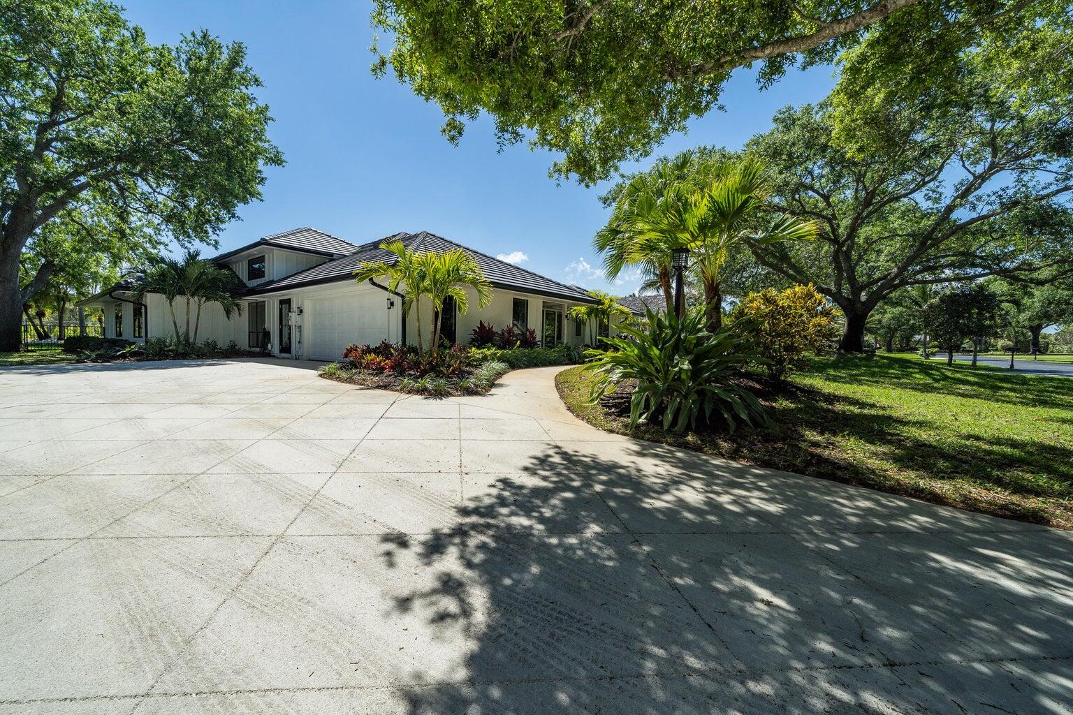 18721 Southeast River Ridge Road Jupiter, FL 33469 - Photo 56 of 74 from driveway