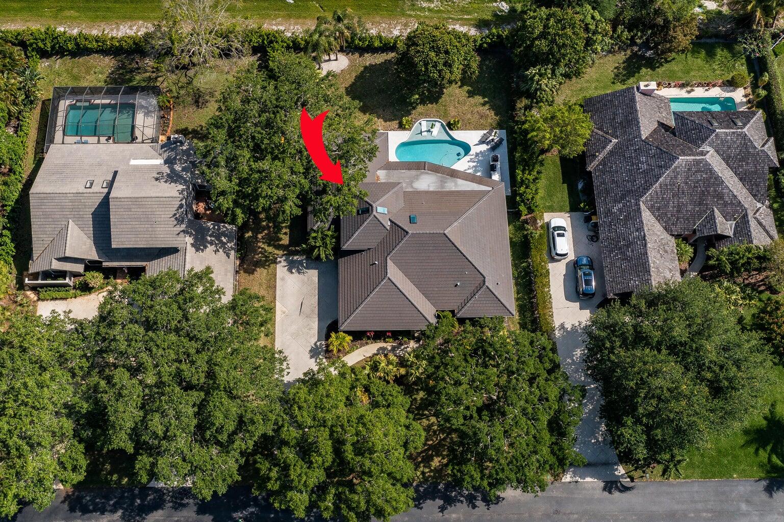 18721 Southeast River Ridge Road Jupiter, FL 33469 - Photo 57 of 74 River ridge aerial with outdoor kitchen