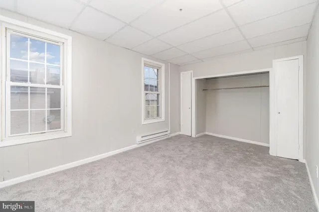 an empty room with windows