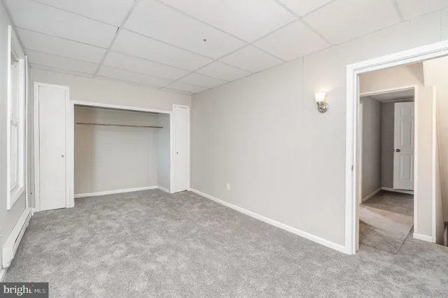 an empty room with closet