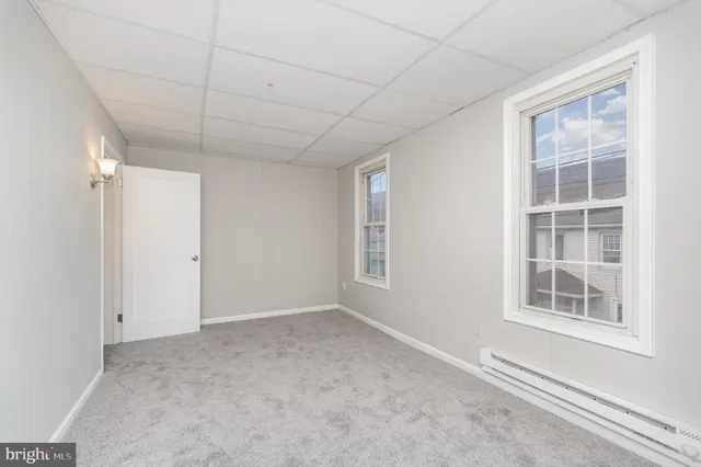 an empty room with windows